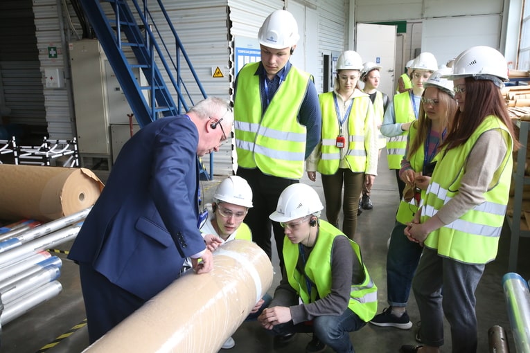 Students evaluate the quality of winding of the main insulation of a high-voltage bushing